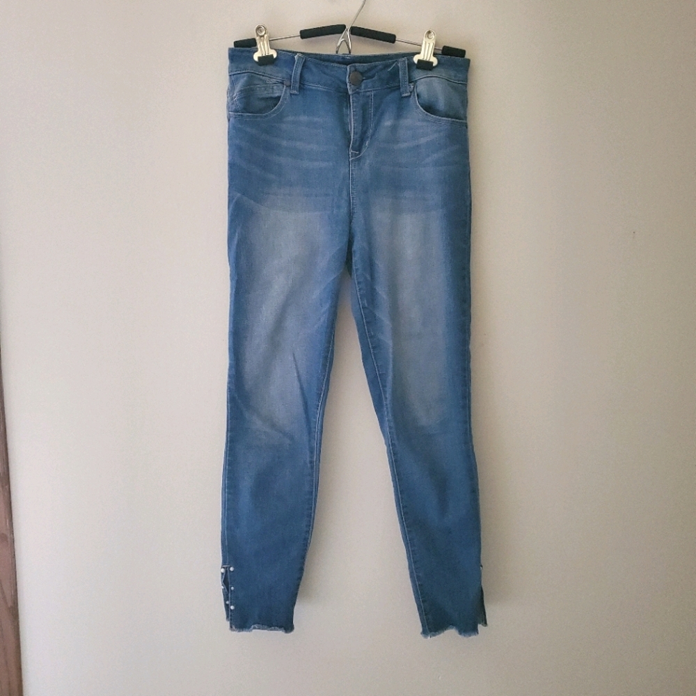 Medium wash jeans with pearl accents